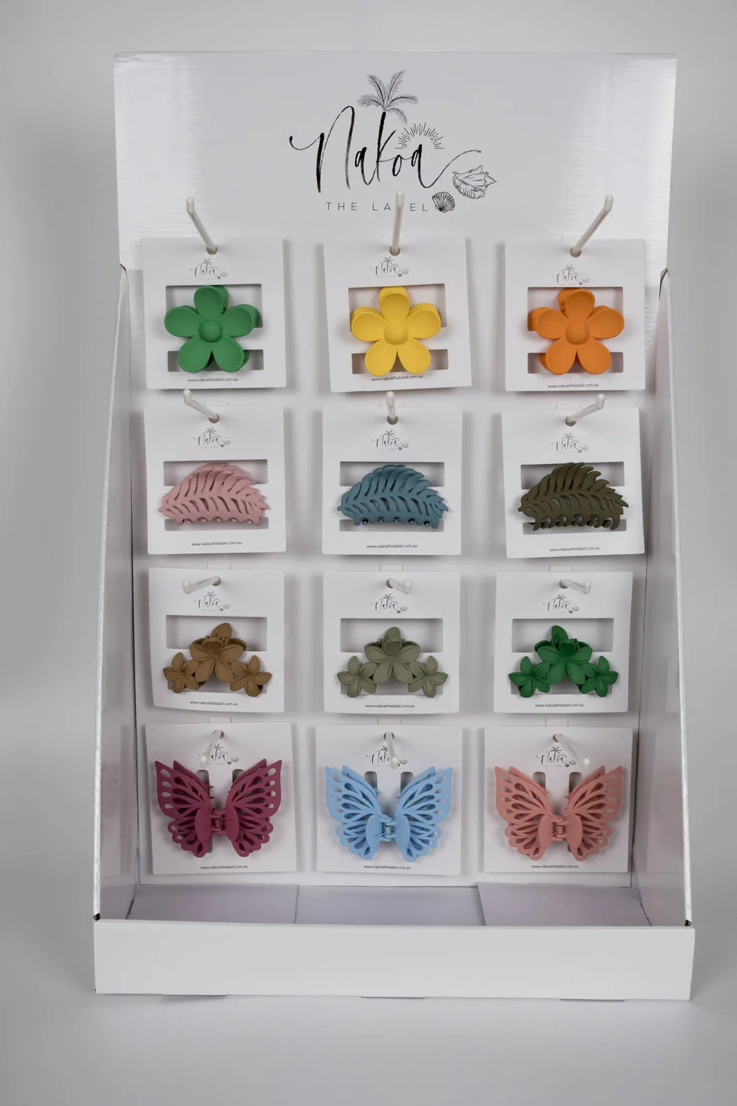 3 x Assorted Flower Claw Clips, 3 Assorted Small Double Butterflies, 3 Assorted Small Leaves, 3 Assorted Frangipani Trios  - 3 Per Colour - Total 36 Pieces